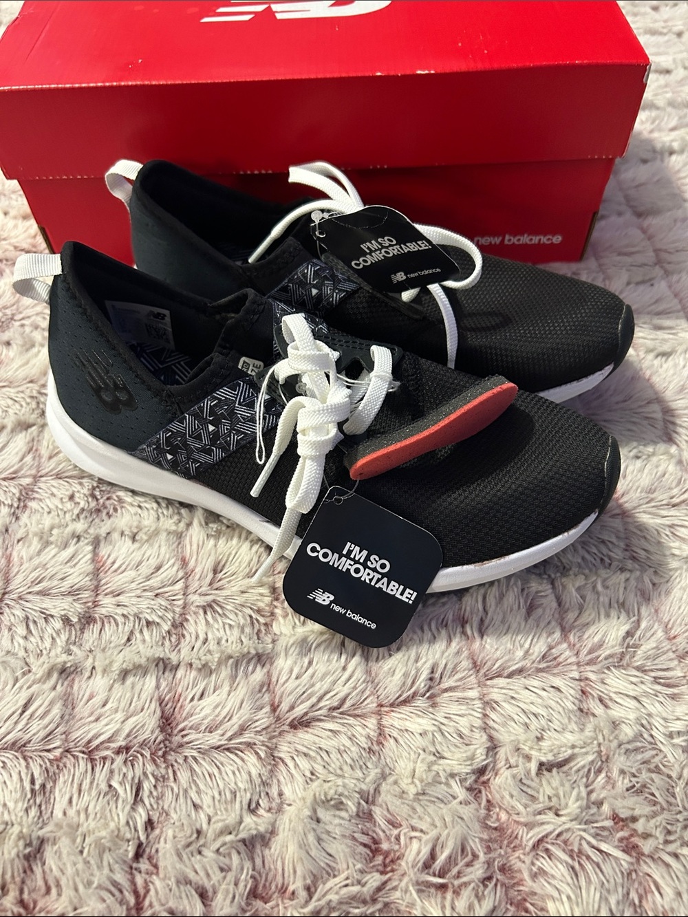 New Balance Black & White women’s Athletic Sneakers size 7